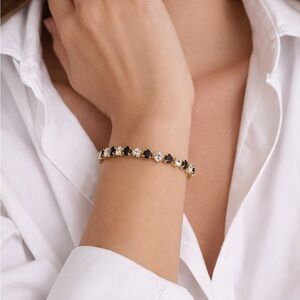 Elegant Gold and Black Bracelet